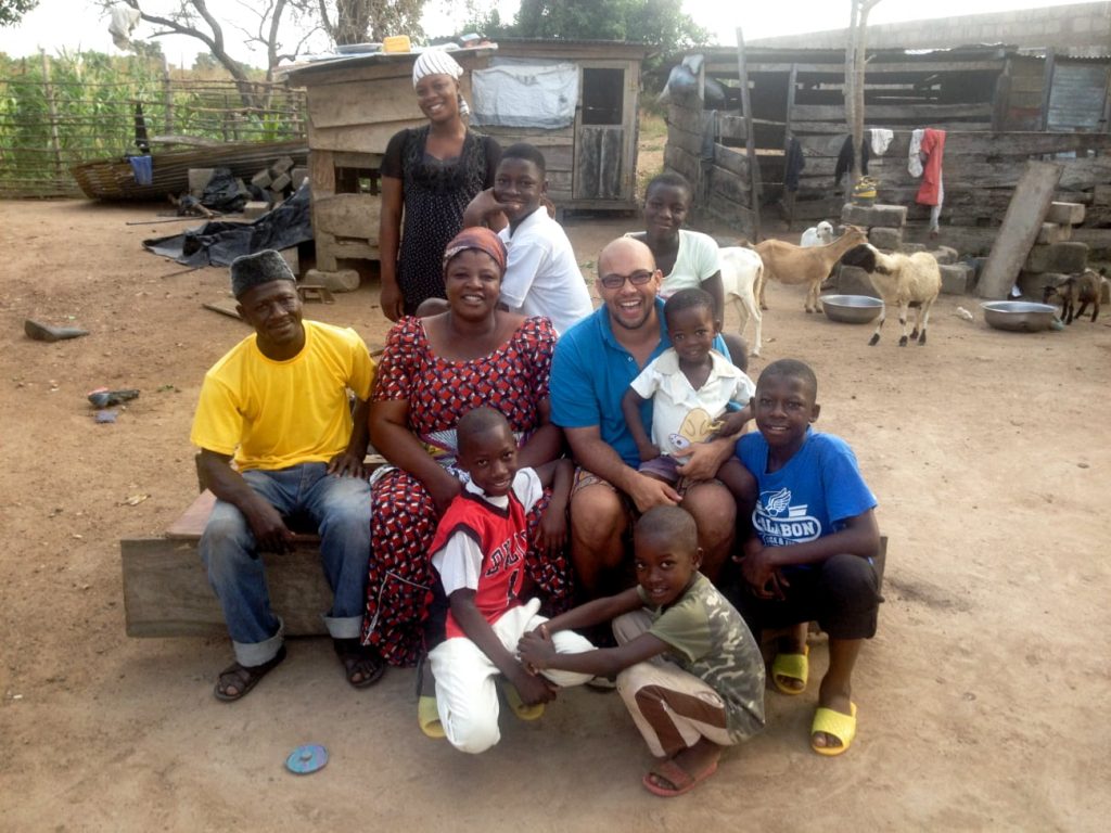 Photo of family sitting outside