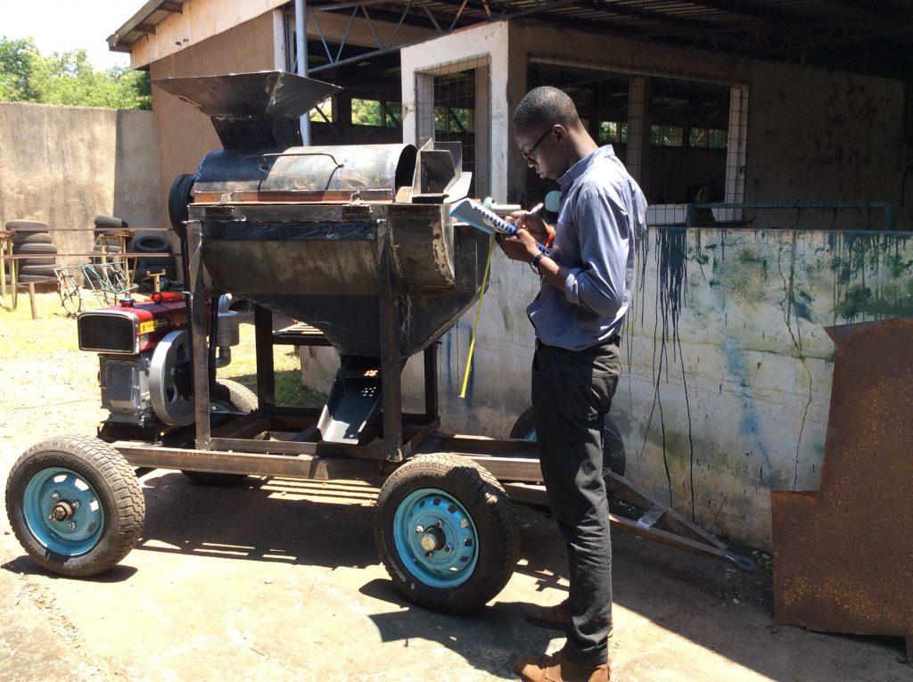 Photo of Appiagyei with machinery 