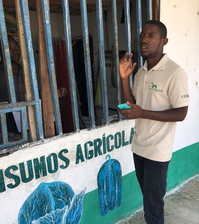 Feliciano of Fintrac Inc delivering supplies to farmers in Mozambique