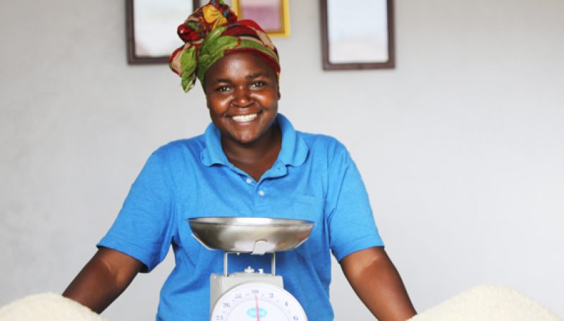 Women entrepreneur with her product and a scale