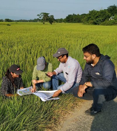 Nepal officials using satellite data in the field.